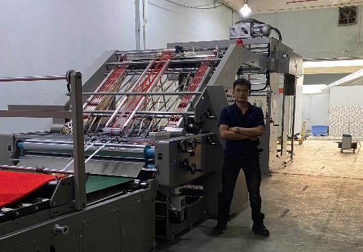 Lắp đặt máy bồi giấy tự động